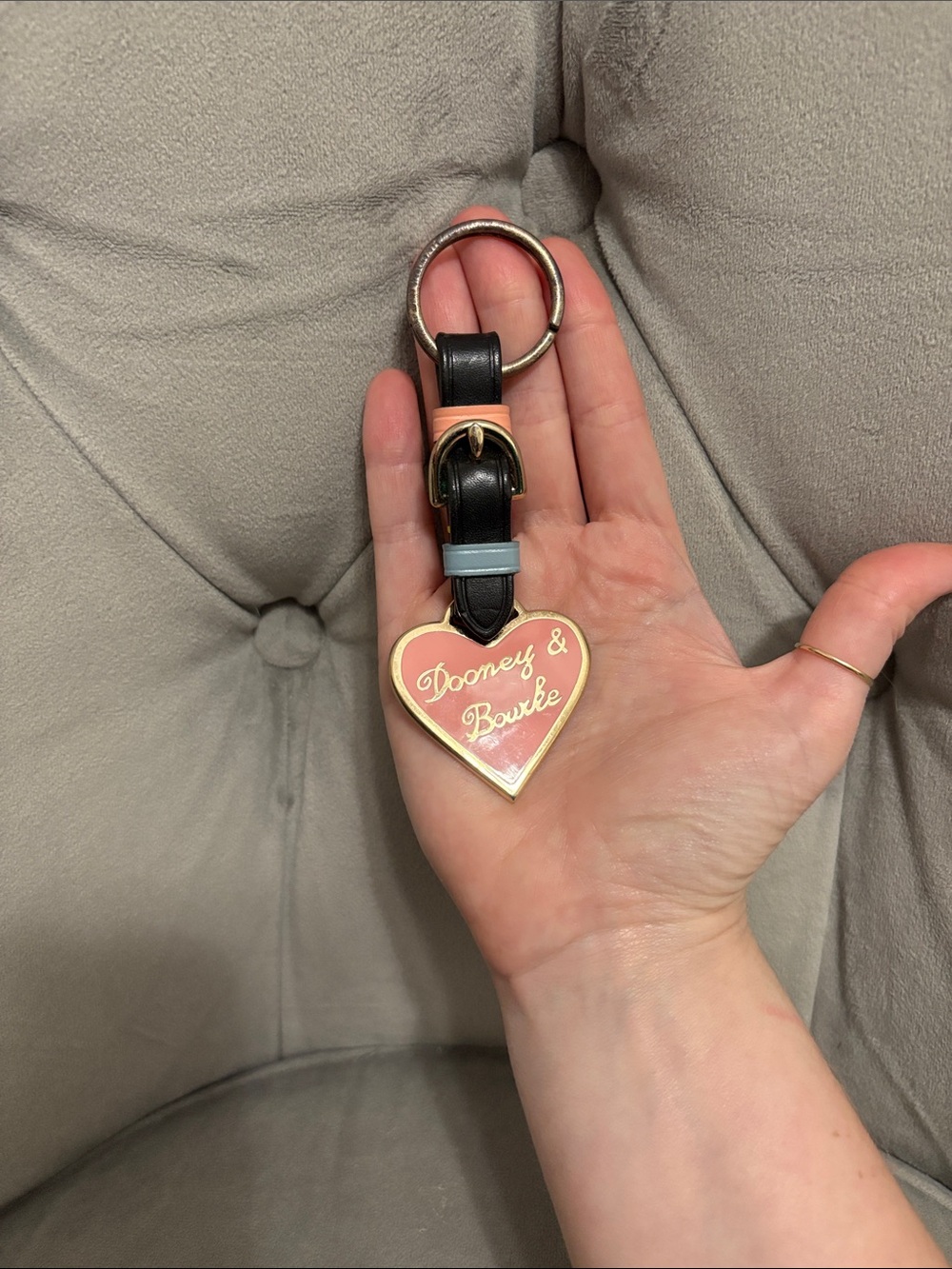 Dooney & Bourke black strap heart key chain tag